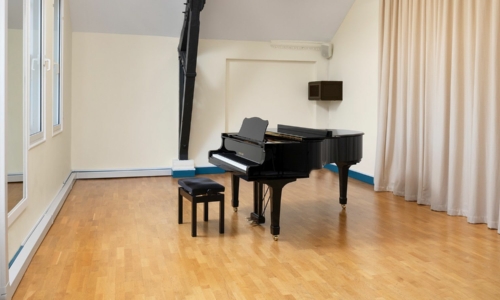 Piano in the middle of The Douglas Kane Studio