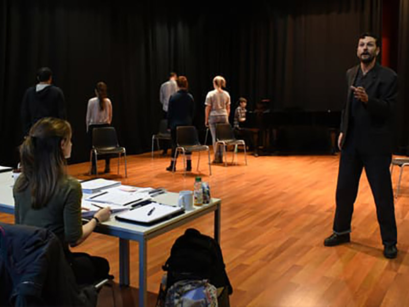 Group of people performing in a room