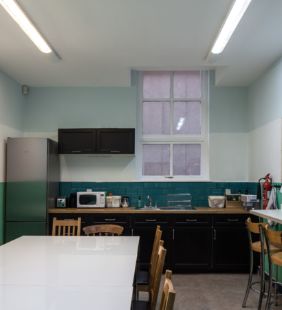 Kitchen area, with large dining room in the middle.