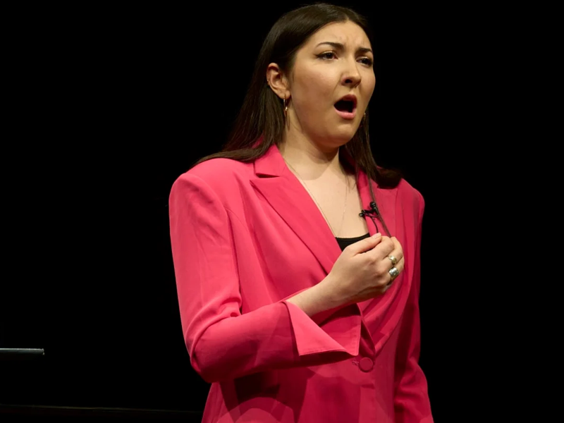 Person singing on stage