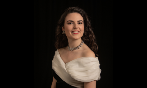 Sofia Kirwan-Baez, National Opera Studio Alum in front of a black background